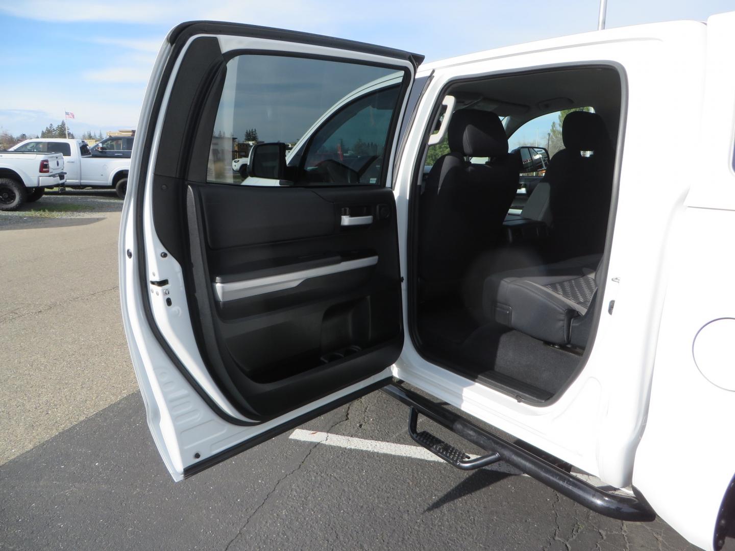 2019 White /BLACK Toyota Tundra SR5 5.7L V8 CrewMax 4WD (5TFDY5F19KX) with an 5.7L V8 DOHC 32V engine, 6A transmission, located at 2630 Grass Valley Highway, Auburn, CA, 95603, (530) 508-5100, 38.937893, -121.095482 - Clean leveled Tundra with 20" Fuel Maverick wheels, Nitto Ridge Grappler tires, N-Fab running boards, Snug Top camper shell with Yakima racks. - Photo#33